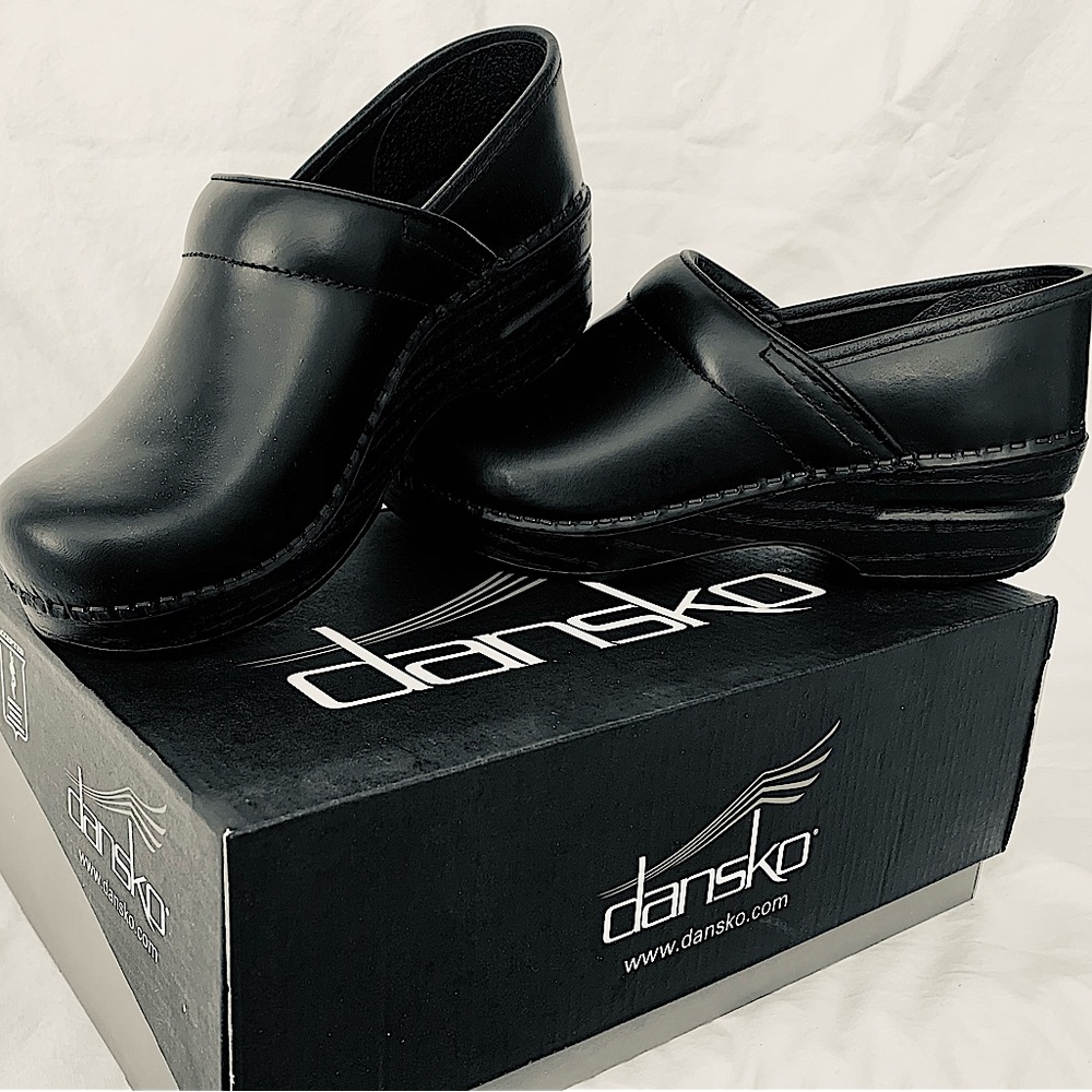 Dansko black mules, New with tags & box, never warn.